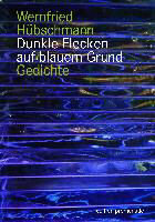 Dunkle Flecken auf blauem Grund